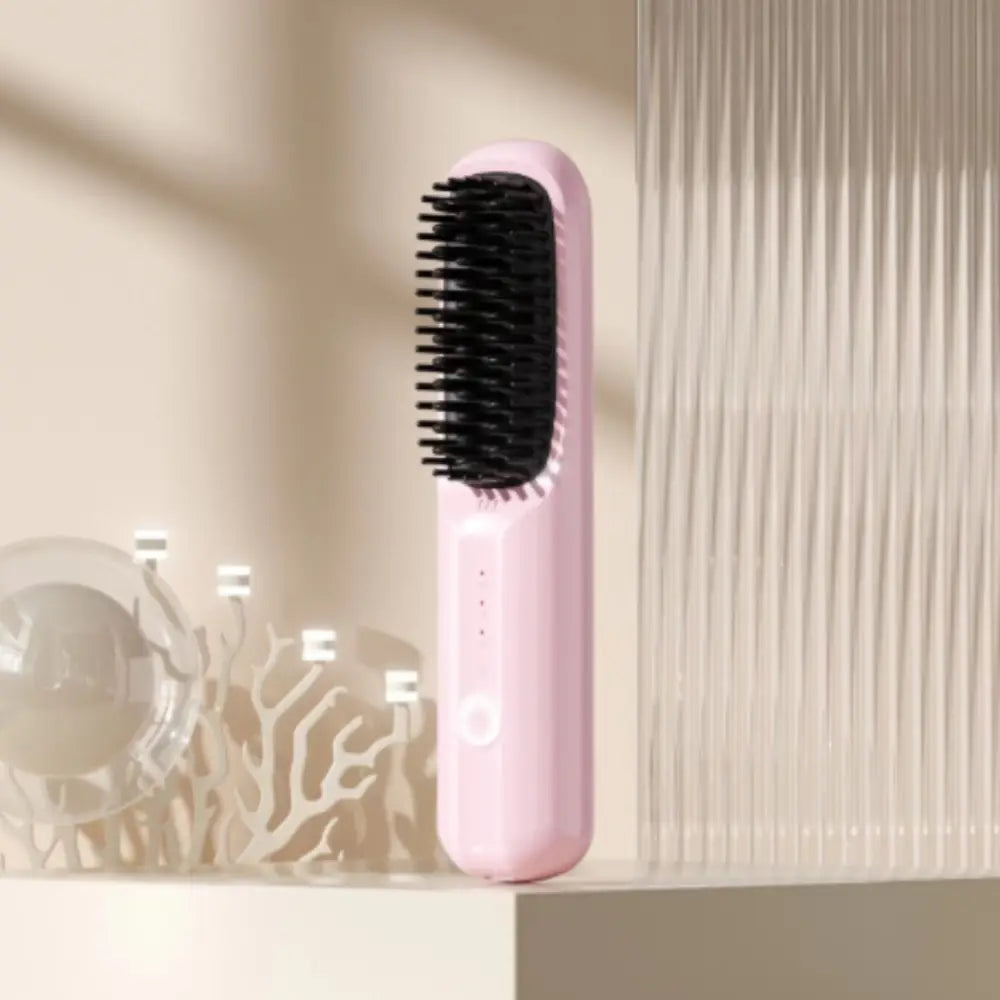 Brosse lissante chauffante - Rose