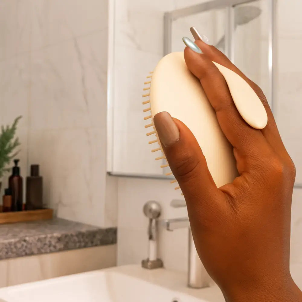 Brosse stimulante cuir chevelu