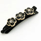 Barrette en forme de fleur - Plastique / Noir