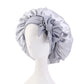 Bonnet en satin pour cheveux bouclés