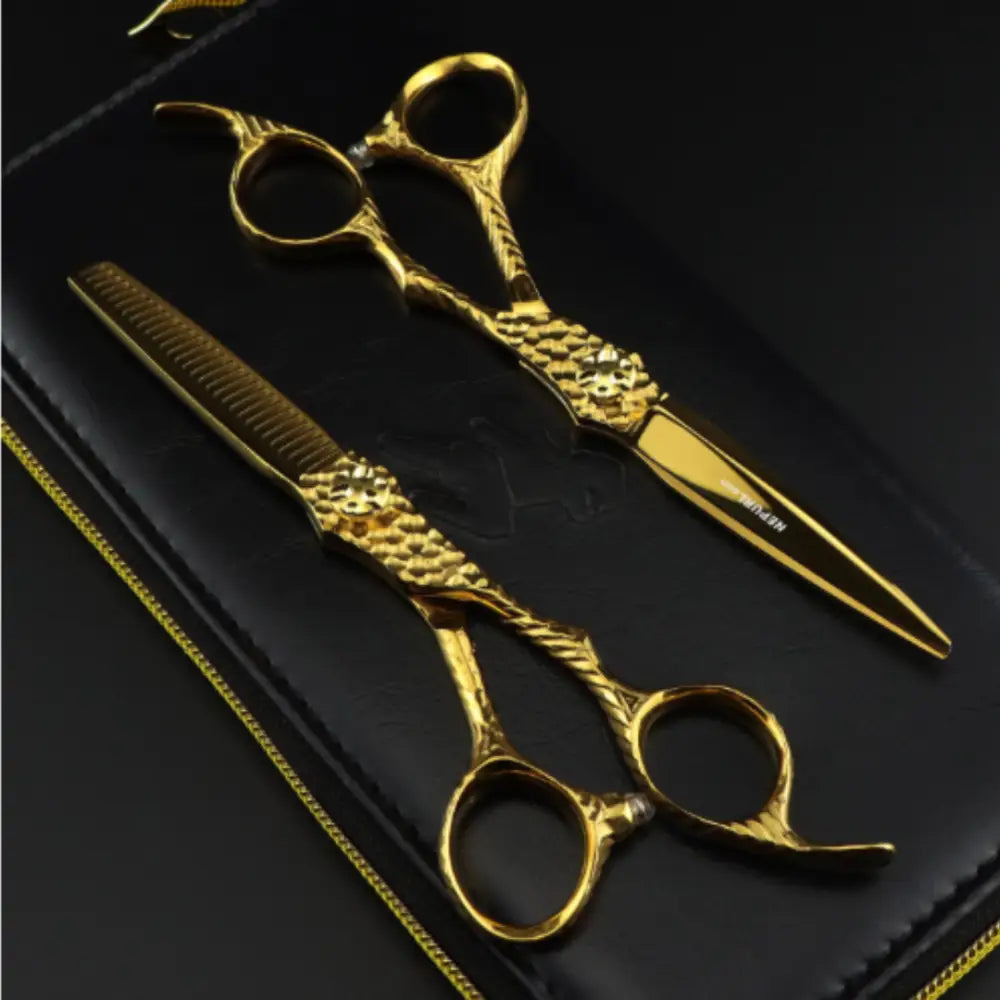 Ciseaux dorés coiffeur